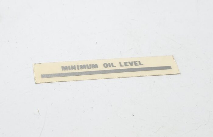Triumph "Minimum Oil Level" Decal - Silver - 2-1/8" x 1/4"