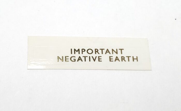 Triumph "Important Negative Earth" Decal - 2-1/8" x 3/8"
